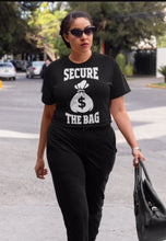 Load image into Gallery viewer, SECURE THE BAG BLACK TSHIRT WITH MONEY BAG IN WHITE LETTERS
